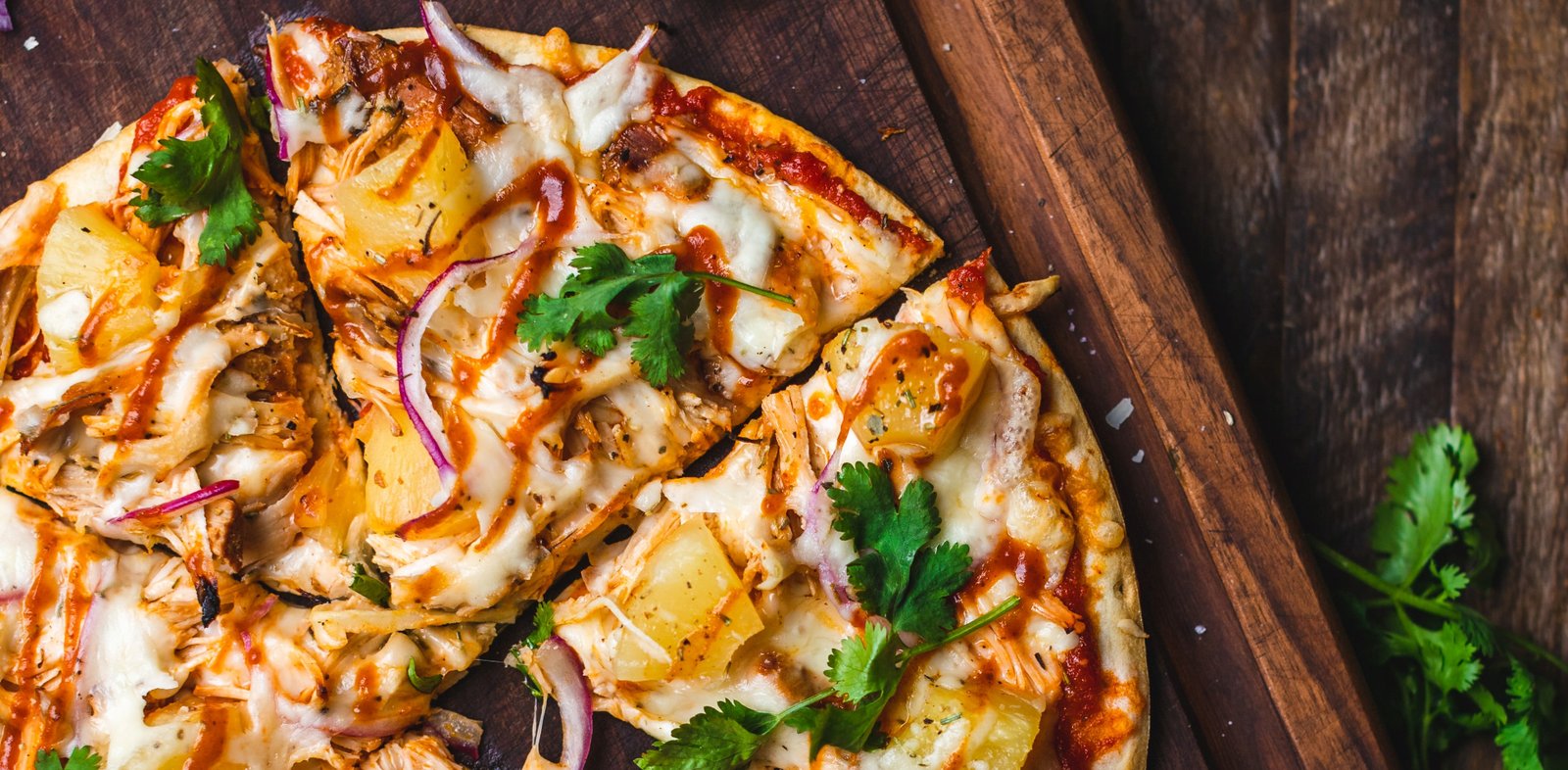 Pizza On Chopping Board